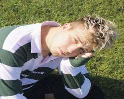 He often colors his hair blonde and light pink though his natural hair is of a different color.